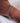 Close-up of the Meda Silver Rose Twist Bracelet on model's wrist